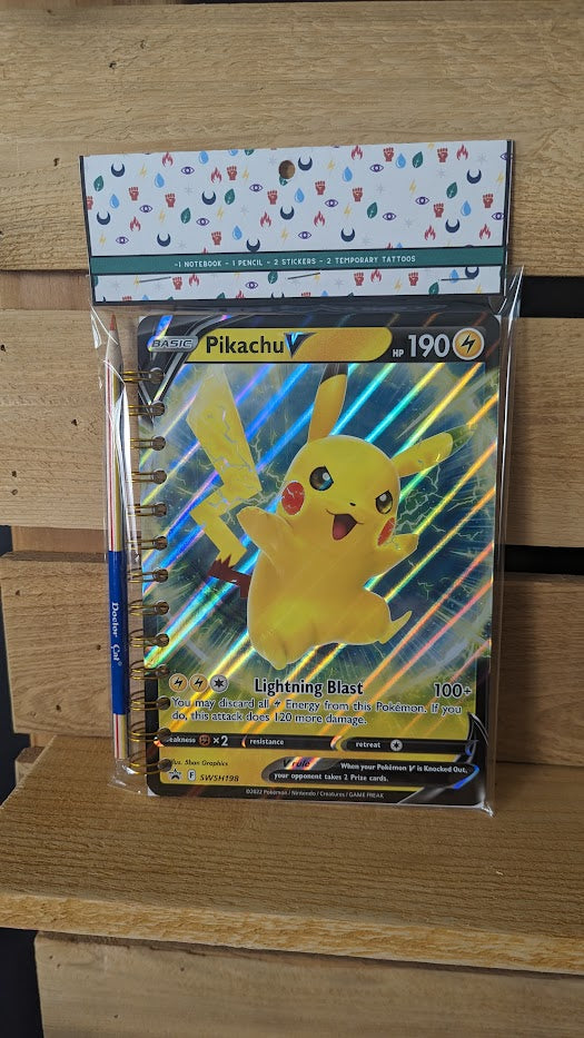 Pokémon card notebooks are packaged with a pencil, two random stickers, and two random temporary tattoos.