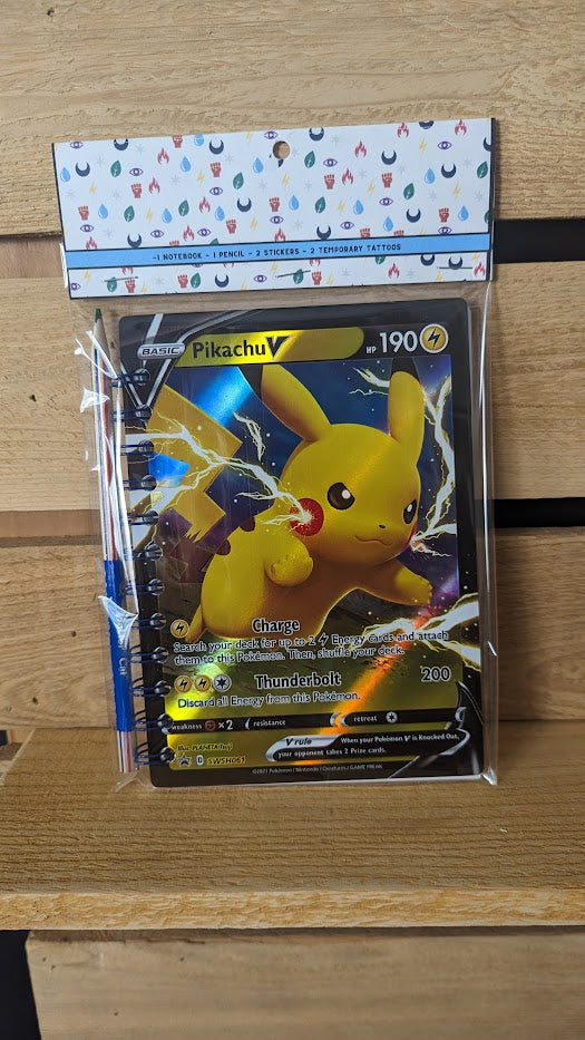 Pokémon card notebooks are packaged with a pencil, two random stickers, and two random temporary tattoos.