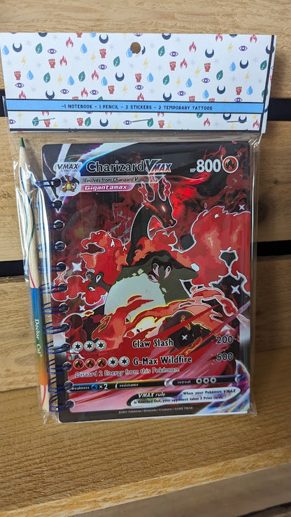 Pokémon card notebooks are packaged with a pencil, two random stickers, and two random temporary tattoos.