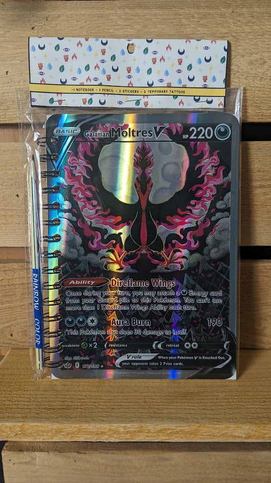 Pokémon card notebooks are packaged with a pencil, two random stickers, and two random temporary tattoos.