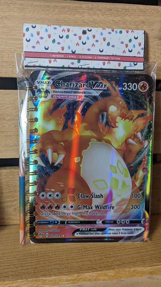 Pokémon card notebooks are packaged with a pencil, two random stickers, and two random temporary tattoos.