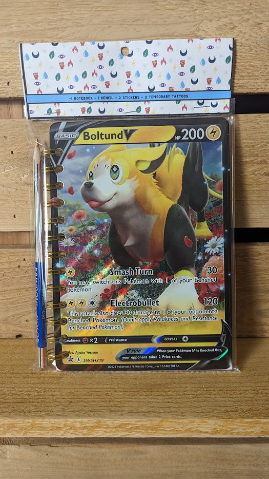 Pokémon card notebooks are packaged with a pencil, two random stickers, and two random temporary tattoos.