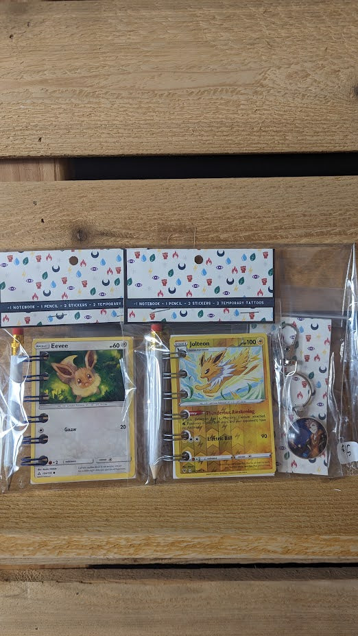 Bundle Pack: Eevee & Jolteon Pokémon Card Notebooks +Spark  Keychain